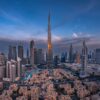 Panoramă din Downtown Dubai cu Burj Khalifa la apus, oraș vizat de programul A Dubai Invite