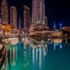 Lacul Burj și turnurile din Downtown Dubai noaptea, oraș vizat de programul A Dubai Invite